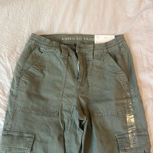 2 american eagle trousers (green and cream)